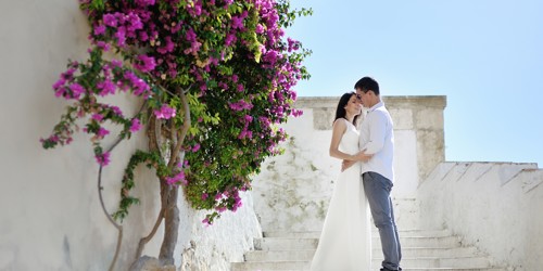 Wedding couple flowers and stairs