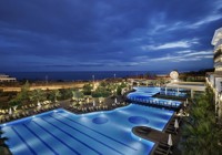 Alba Royal. Outdoor Pool By Night