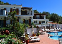 Pool area at the Filokalia Apartments in Skiathos