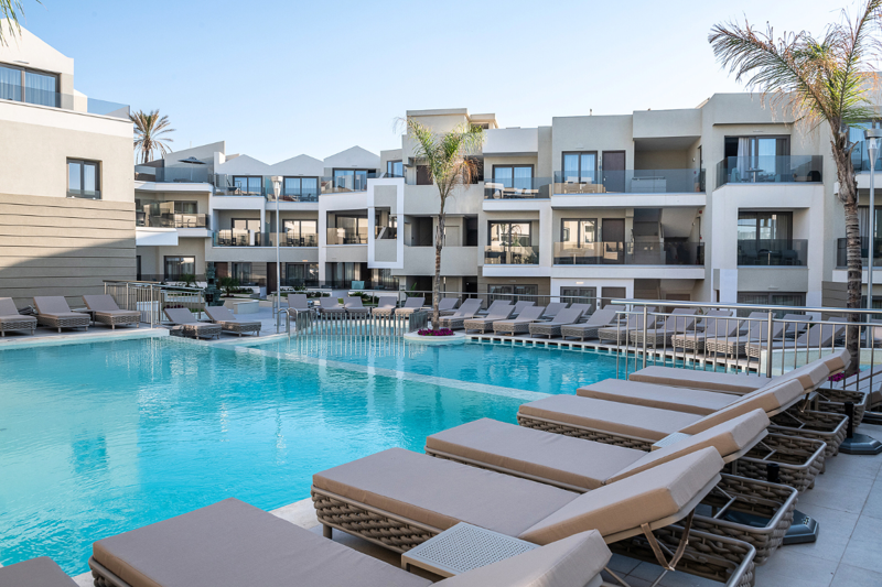 Sunbeds at pool in Porto Platanias Village