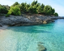 Beautiful Pebbly Beach In Istria. Turquoise Bay In Cape Kamenjak Nature Park.