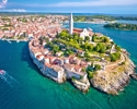 Town Of Rovinj Historic Peninsula Aerial View, Famous Tourist Destination In Istria Region Of Croatia