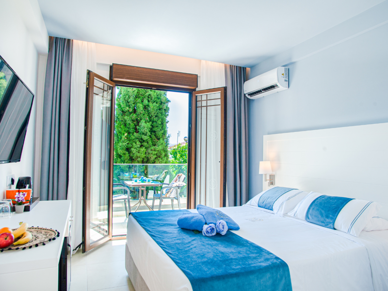 Double Room Bedroom at Acrotel Lily Ann Village