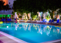 Night View of Pool at Porto Plazza Hotel