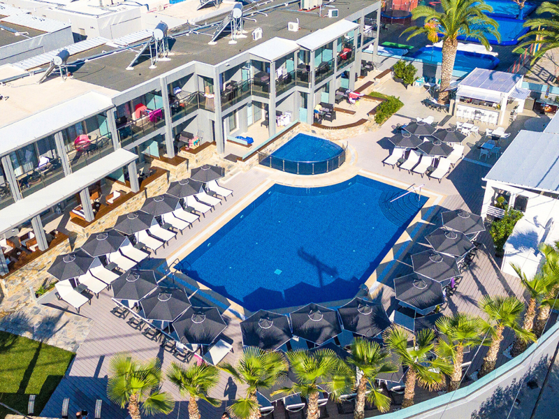 Overview of Swimming Pool Area at Dionysos Hotel and Studios