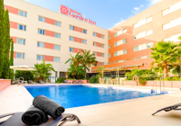 Exterior View of Hilton Garden Inn Malaga and Swimming Pool