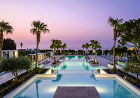 Romantic Poolscape with Sea View at Grecotel LUXME Dama Dama